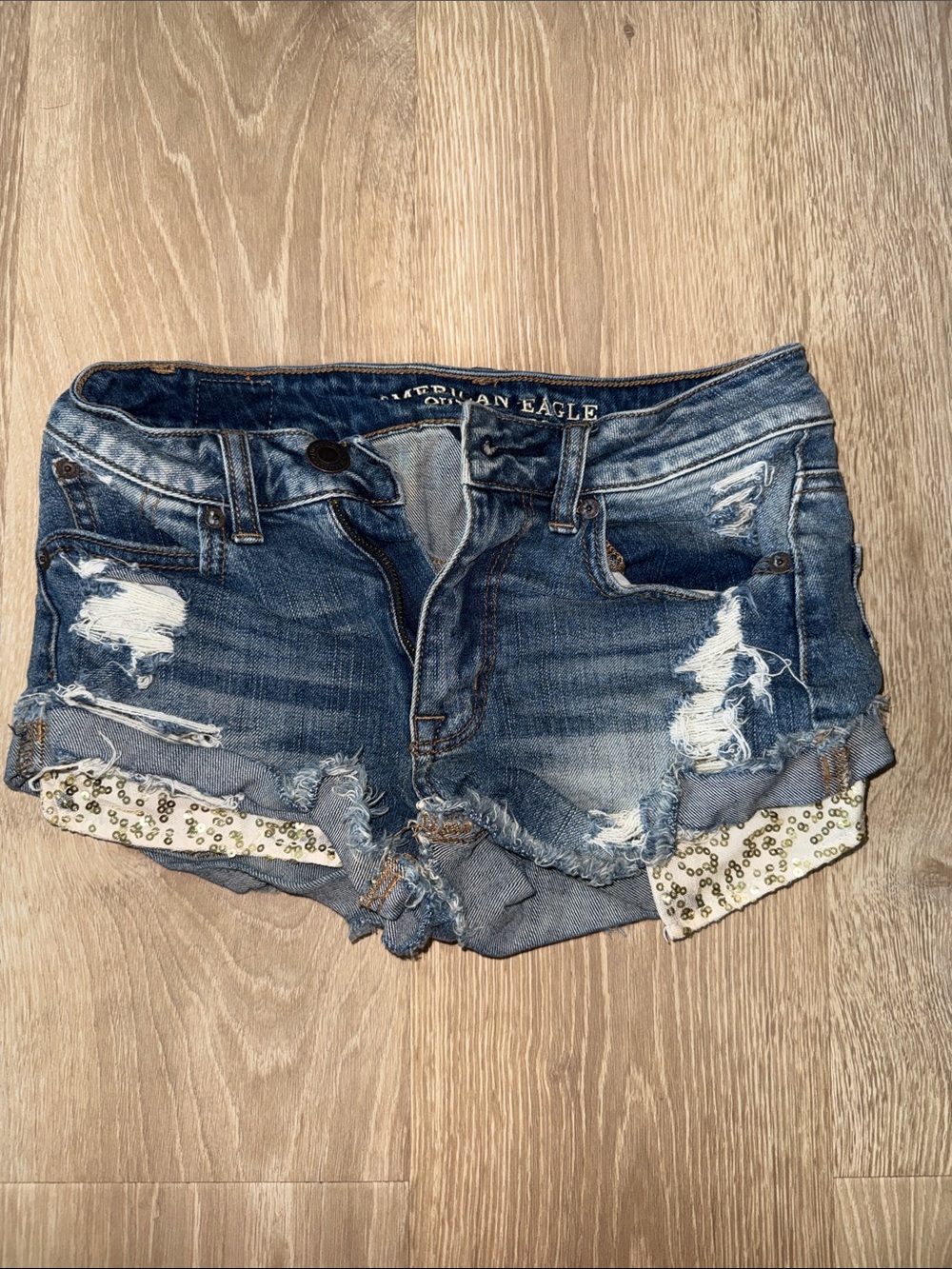 American Eagle Outfitters Ripped Dark Blue Denim Shorts with Sequin Lining